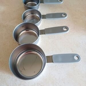 NWOT Stainless Steel Measurement Cups with Silicone handle
